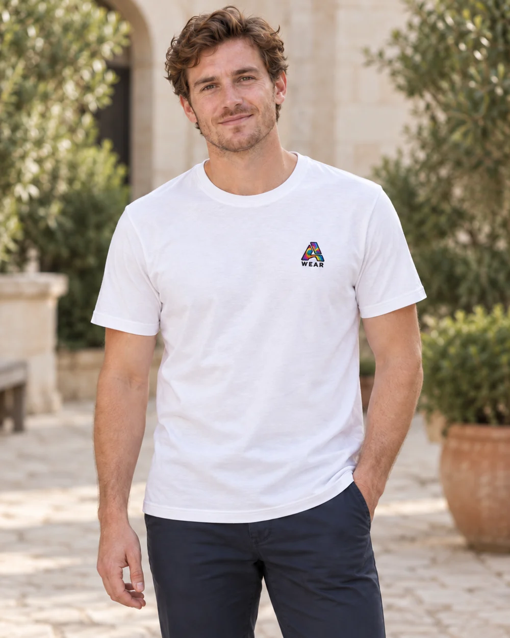 Colourful Full Spectrum A-wear embroidery on a white T-shirt